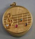 14kt Gold Gemset Music Box Fob