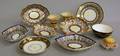 Eleven Pieces of Assorted English Gilt Cobalt and Handpainted Porcelain Tableware