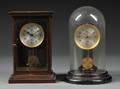 Two Poole Electric Clocks