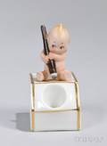 Kewpie Sitting on an Inkwell