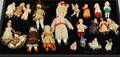 Group of Twentyone Small Dolls and Figurines