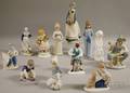 Twelve Assorted Collectible Ceramic Figures