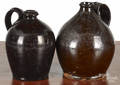 Two Pennsylvania redware jugs