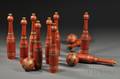 Set of Ten RedPainted Turned Wooden Bowling Pins and Three Balls