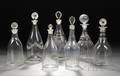 Seven Assorted Colorless Glass Decanters