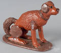 Contemporary redware figure of a seated hound