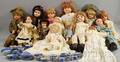 Group of Reproduction Dolls and a Blue and White Transferdecorated Childs Tea Set