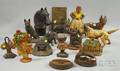 Thirteen Painted Cast Iron Figural Doorstops a Horse Head Hitching Post Top a Bronze Plaque Boy Wanted and Two Irons