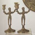 Pair of figural brass candlesticks ca 1900