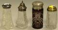 Three Late Victorian Cut Glass and a Colorless Pressed Glass Sugar Casters
