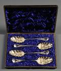 Set of Four English Sterling Silver Fruit Servers