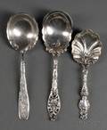 Three Assorted American Sterling Silver Serving Spoons