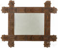 Tramp art carved mirror