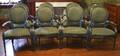 Set of eight green painted Louis XVI style armchairs