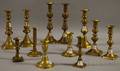 Twelve Brass Pushup Candlesticks