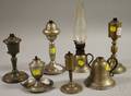 Seven Pewter Fluid Peg Lamps