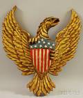 Giltwood and Polychrome Painted Carved Pine Eagle Clutching Shield Plaque