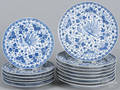 Fourteen Japanese blue and white porcelain plates
