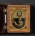Ninth Plate Ambrotype Portrait of a Young Girl Holding a Chalkware Cat