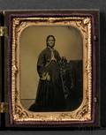Quarter Plate Tintype of an Elegantly Dressed Standing Black Woman