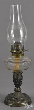 Embossed spelter and colorless glass fluid lamp