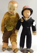 Two Composition Soldier Boy Dolls