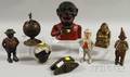Seven Painted Cast Iron Figural Still Banks and a Jolly N Painted Cast Iron Mechanical Bank