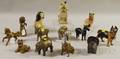 Twelve Painted Cast Iron and Metal Animal Figural Still Banks and a Small Doorstop