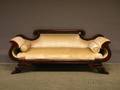 Empire Upholstered Carved Mahogany and Mahogany Veneer Sofa with Paw Feet