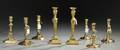 Eight Brass Candlesticks