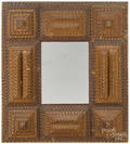 Tramp art carved mirror