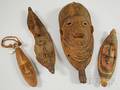 Four New Guinean Carved Wood Masks