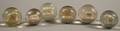 Six Colorless Glass Sulfide Marbles
