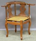 Queen Annestyle Carved Walnut Roundabout Chair with Woven Rushstyle Seat