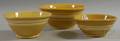 Three Whitebanded Yellowware Mixing Bowls
