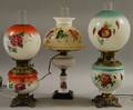 Three Late Victorian Handpainted Glass Kerosene Lamps with Metal Fittings