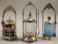 Three Late Victorian Silverplate and Pressed Glass Pickle Casters