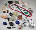 Two Ruby and Emerald Beaded Necklaces and a Large Number of Unmounted Stones