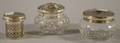Three Glass and Sterlinglidded Jars