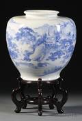 Chinese Blue and White Landscapedecorated Porcelain Jar and a Chinese Export Marbleinset Carved Hardwood Stand