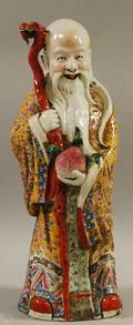 Chinese Enameldecorated Porcelain Figure of an Immortal