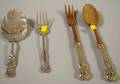Four Sterling Silver and Sterling Silverhandled Flatware Serving Items