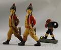 Pair of Painted Cast Iron Hessian Soldier Figural Andirons and a Painted Cast Iron Pirate Figural Doorstop