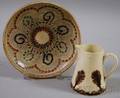 Mochaware Cream Jug and Slipdecorated Earthenware Dish