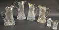 Four Colorless Cut Glass Pitchers and a Pair of Tumblers