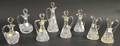 Eight Colorless Cut Glass Cruets