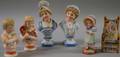 Two Continental Painted Bisque Figural Groups and Two Pairs of Busts of Children