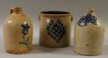 Two Cobalt Floraldecorated Stoneware Jugs and a Twogallon Crock