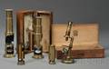 Five Brass Student Microscopes