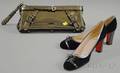 Burberry Gunmetal Patent Leather Clutch and a Pair of Christian Louboutin Black Suede Pumps